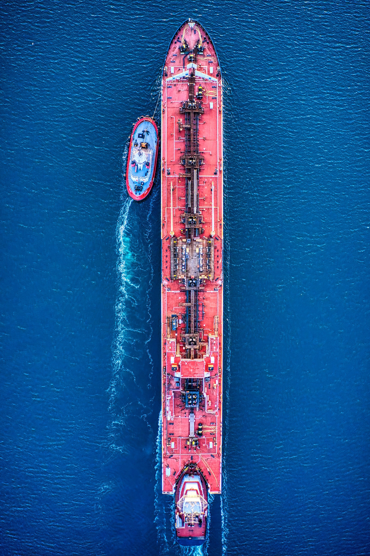 aerial view of a cargo ship preparing to be boarded for Industrial maintenance and monitoring